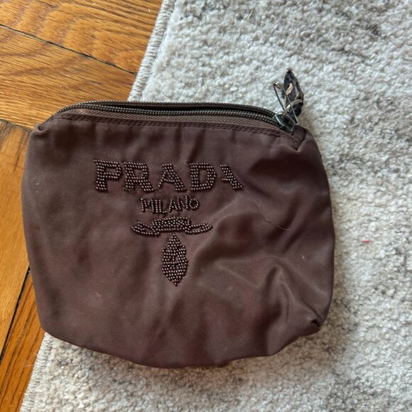 Prada Milano brown nylon pouch with tonal beaded logo detail at front. Features - Picture 1 of 5